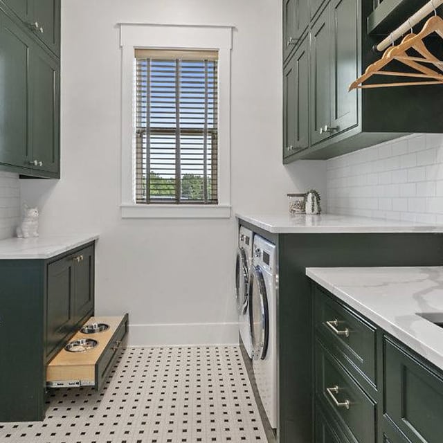 laundry room with green cabinets